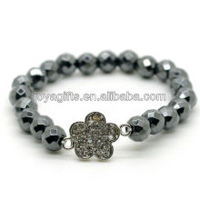 Hematite magnético 8mm tallado cuentas redondas Stretch pulsera de piedras preciosas con aleación de diamante Flower Piece